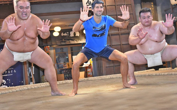 Novak Djokovic in Tokyo, tries hand on Wrestling