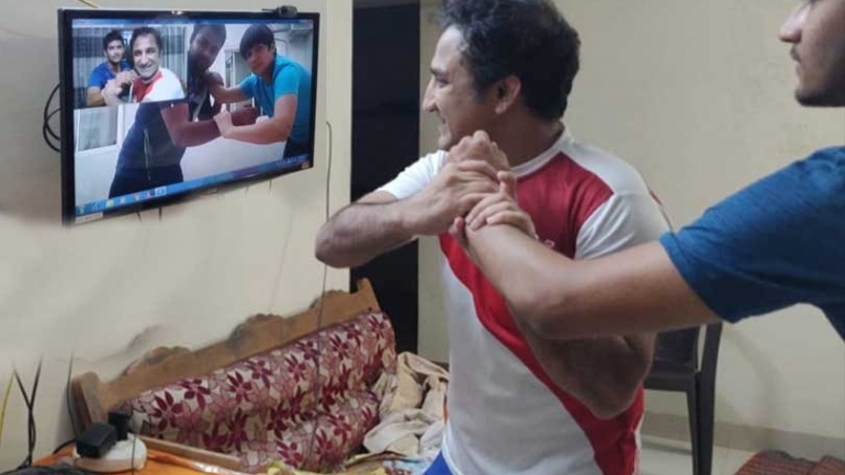 No mat training? Famed coach Kripa Shankar goes online to coach young wrestlers